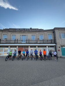 A group of cyclists in front of the Tropicana, Weston-s-Mre
