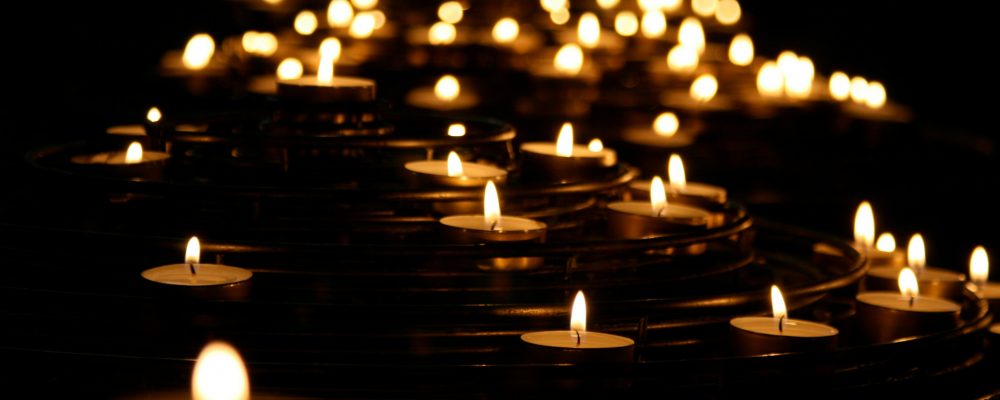 candles floating in water